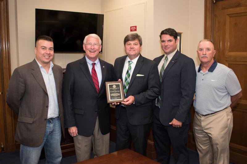 Representatives from the Regional Counterdrug Training Academy present an award to U.S. Senator Roger Wicker in Washington, D.C., on Wednesday, September 20, 2017.