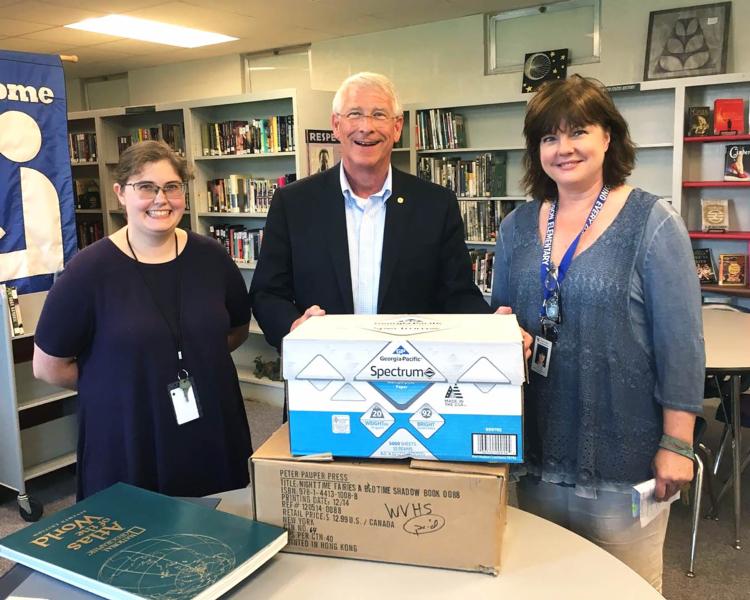 U.S. Senator Roger Wicker, R-Miss., drops off two boxes of books at Water Valley High School, in Water Valley, Miss., on Monday, August 21, 2017.